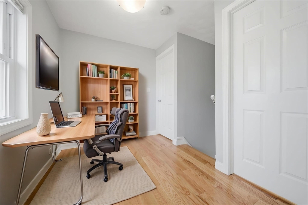 7 Pine Street Stoneham, MA 02180 - Photo 10 of 23 a view of a workspace with furniture and a window