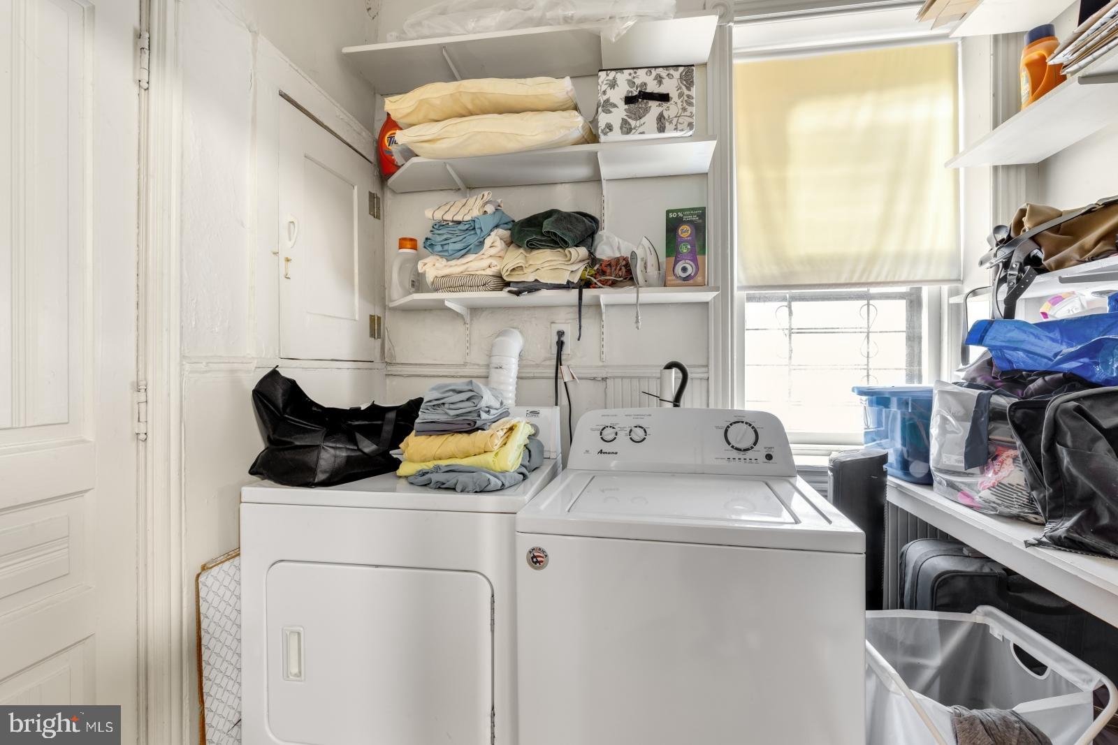 4713 Baltimore Avenue, Unit 1 Philadelphia, PA 19143 - Photo 15 of 22 a utility room with sink dryer and washer