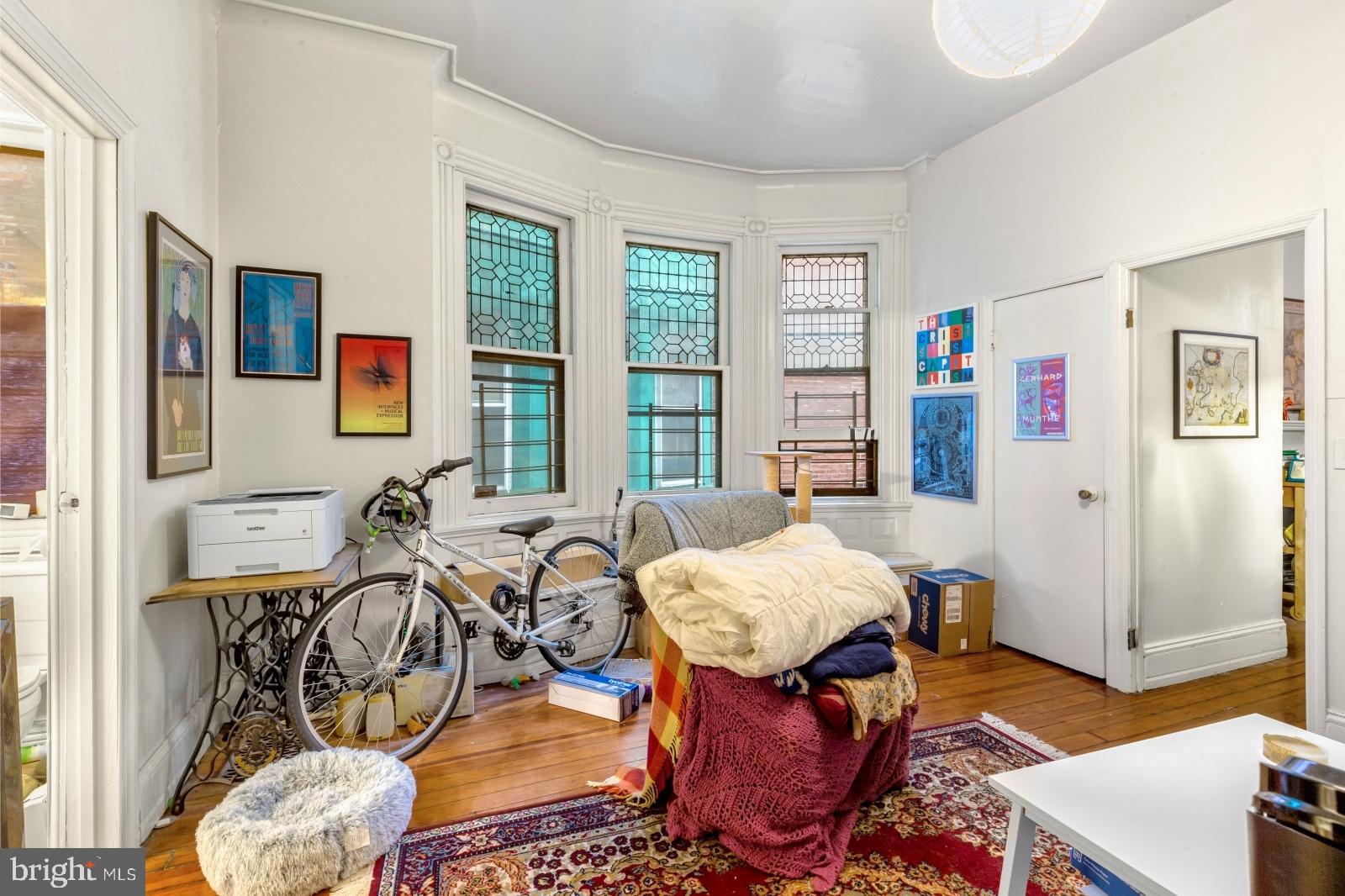 4713 Baltimore Avenue, Unit 1 Philadelphia, PA 19143 - Photo 10 of 22 a view of a livingroom and dining room
