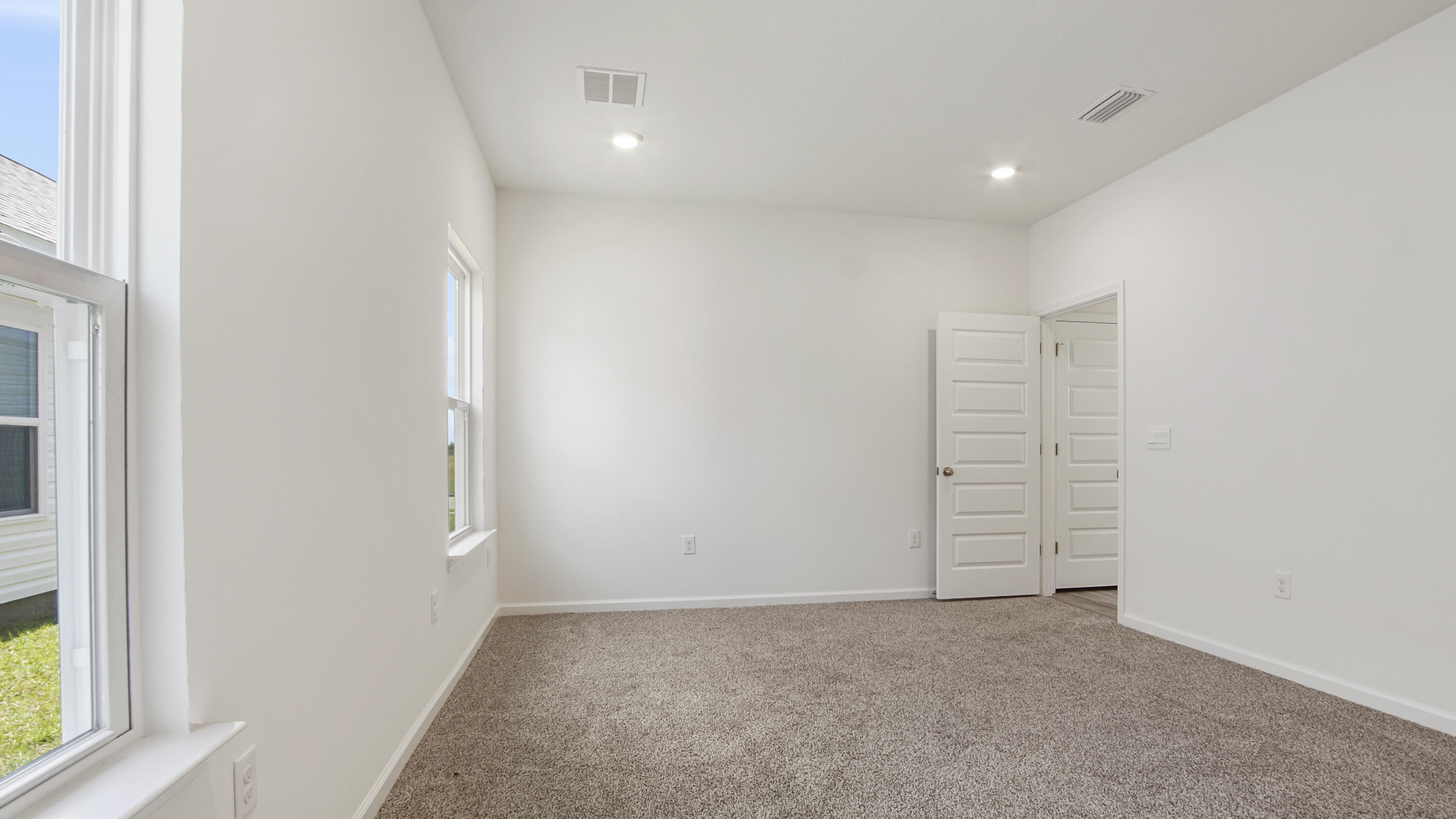 73 Longsedge Street Freeport, FL 32439 - Photo 24 of 34 an empty room with windows