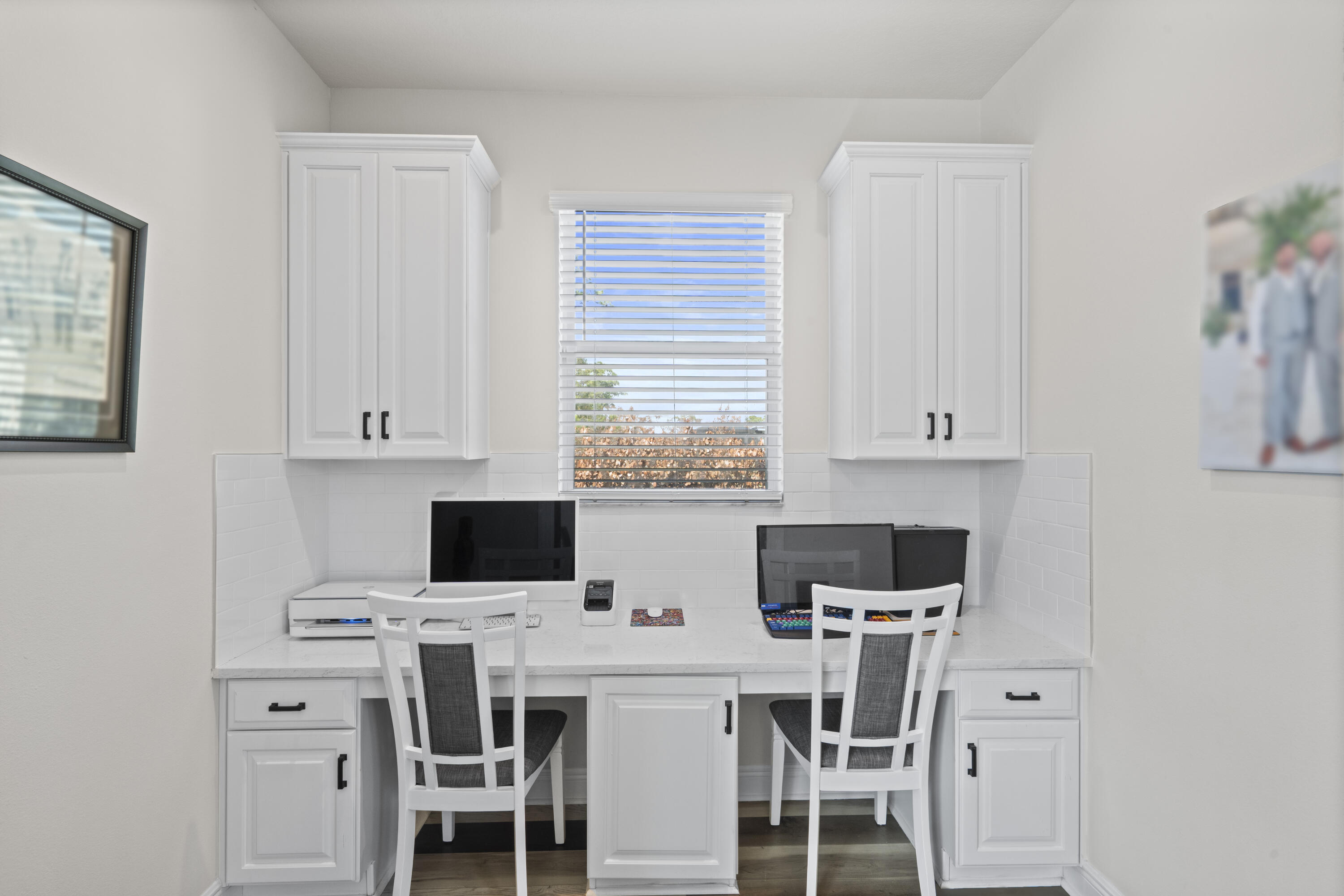 684 Southwest Pennfield Terrace Stuart, FL 34997 - Photo 21 of 61 a view of a dining room with furniture and a window