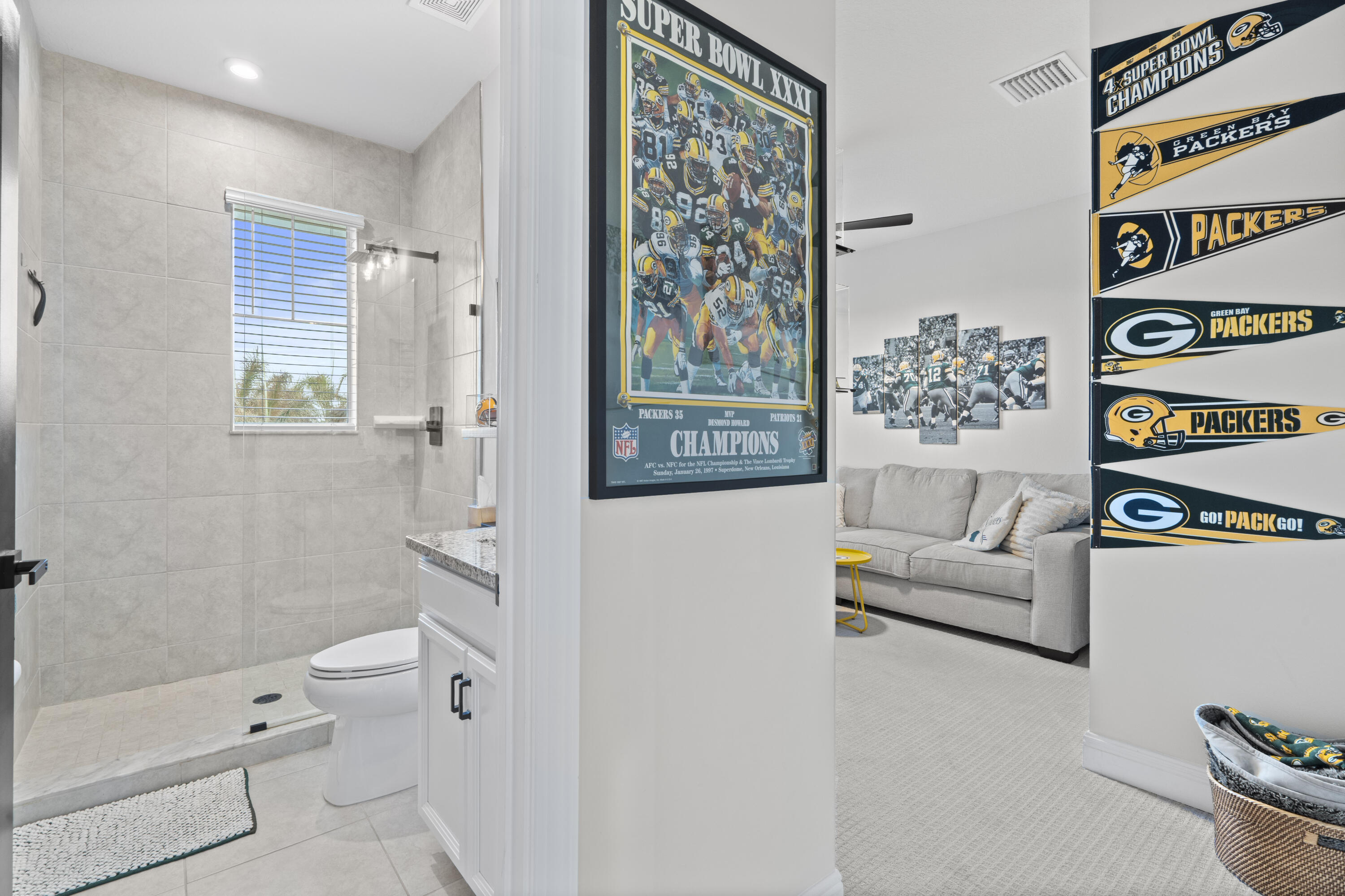 684 Southwest Pennfield Terrace Stuart, FL 34997 - Photo 34 of 61 a living room with furniture and a window