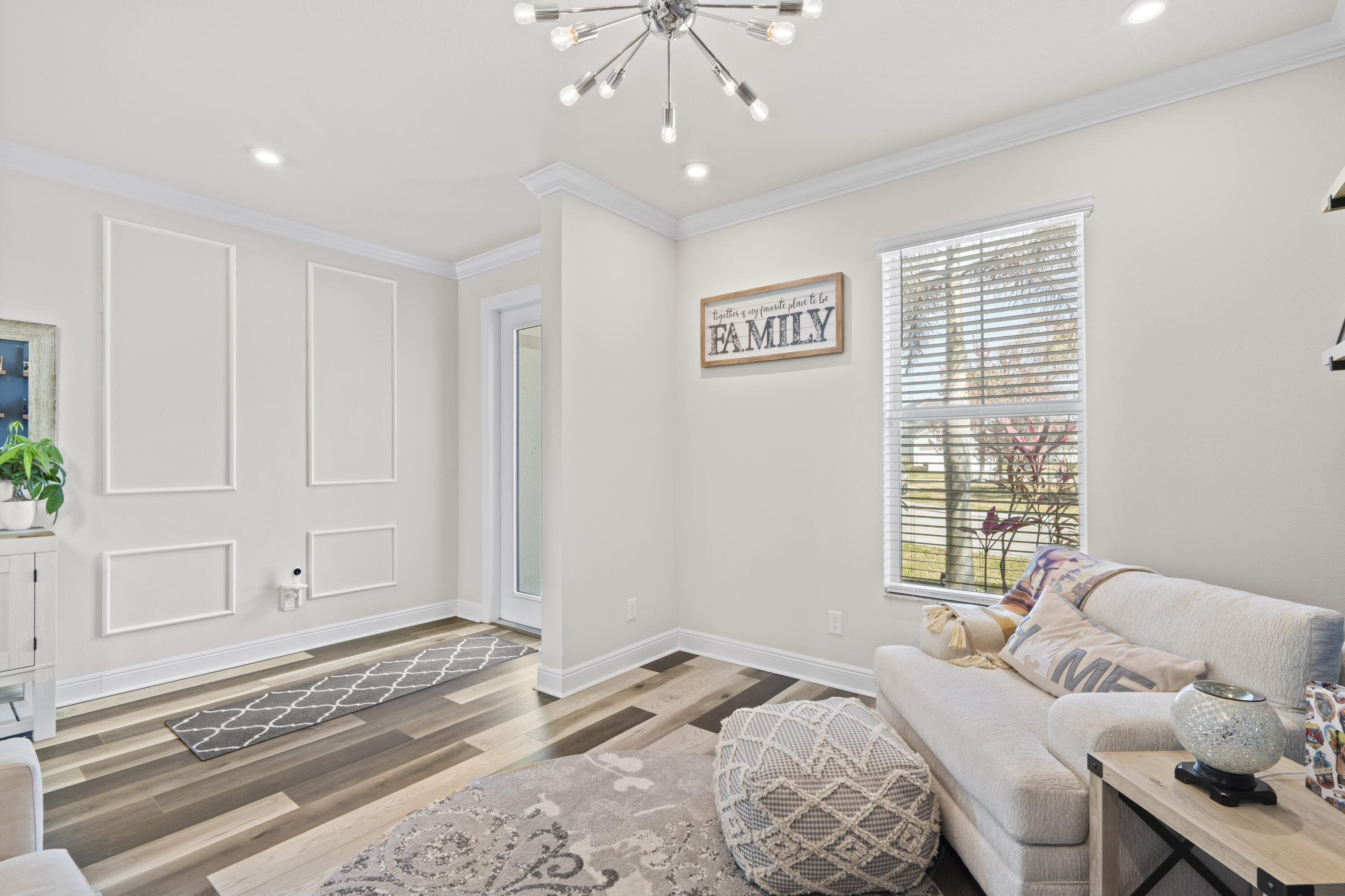 684 Southwest Pennfield Terrace Stuart, FL 34997 - Photo 5 of 61 a bedroom with a bed and a window