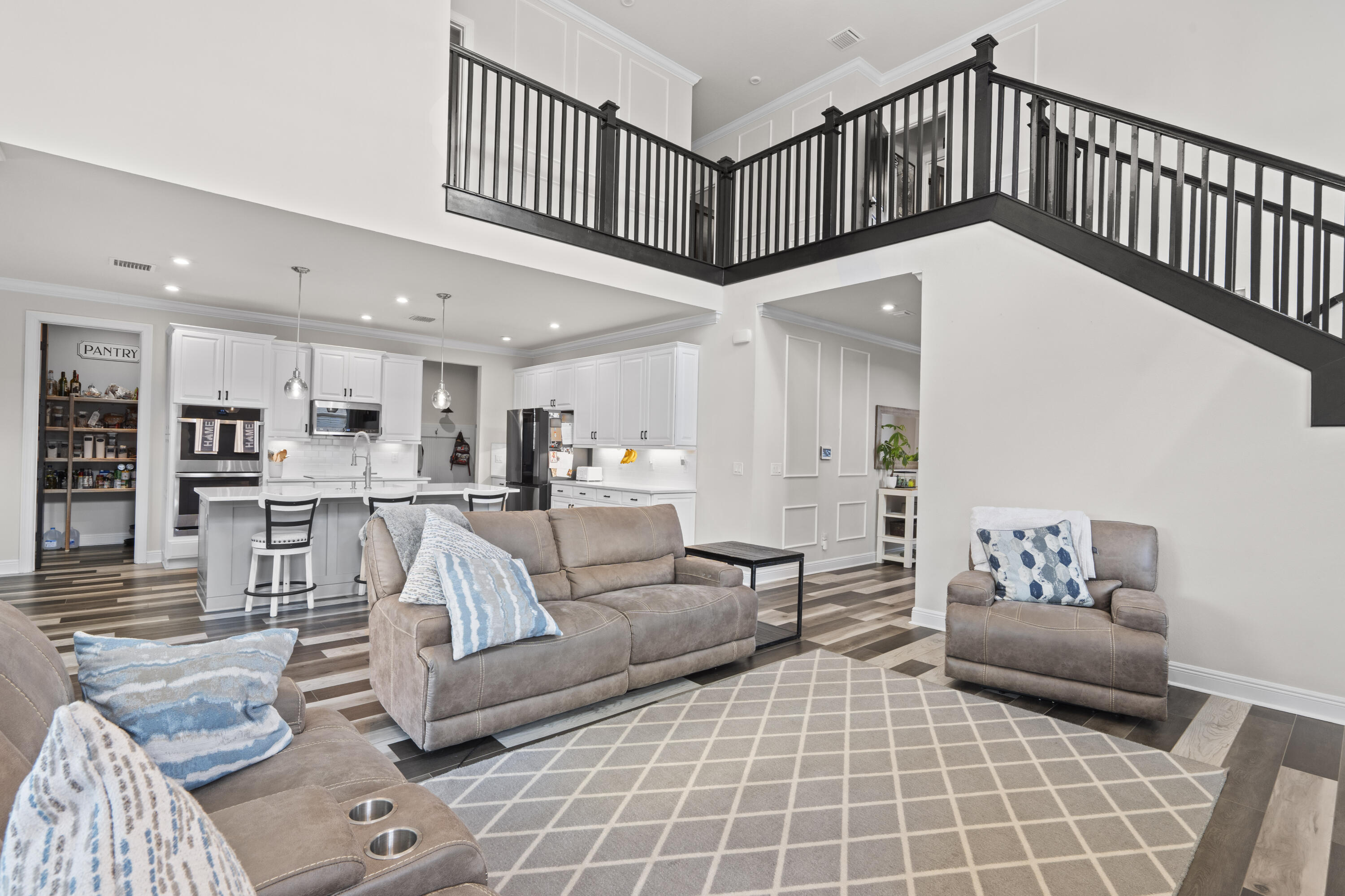 684 Southwest Pennfield Terrace Stuart, FL 34997 - Photo 10 of 61 a living room with furniture and a ceiling fan