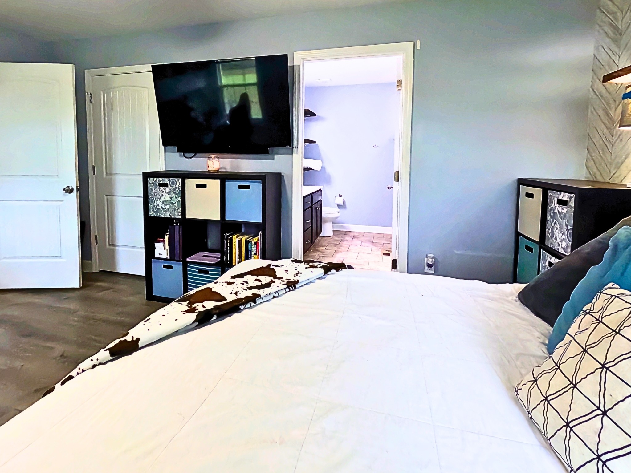 4631 Turquoise Lane Murfreesboro, TN 37129 - Photo 15 of 42 a bedroom with a bed and a flat screen tv