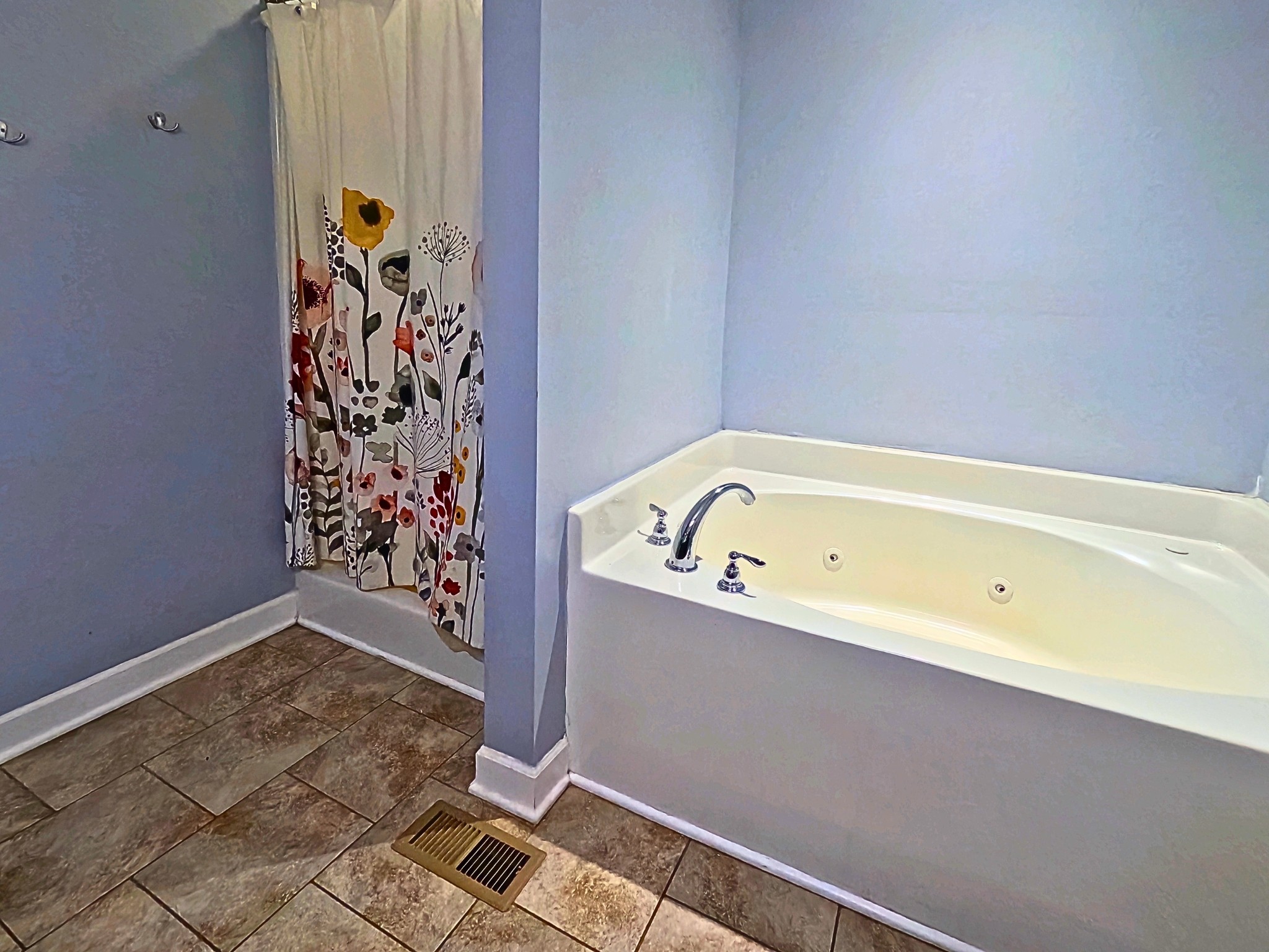 4631 Turquoise Lane Murfreesboro, TN 37129 - Photo 19 of 42 a bathroom with a bathtub and shower