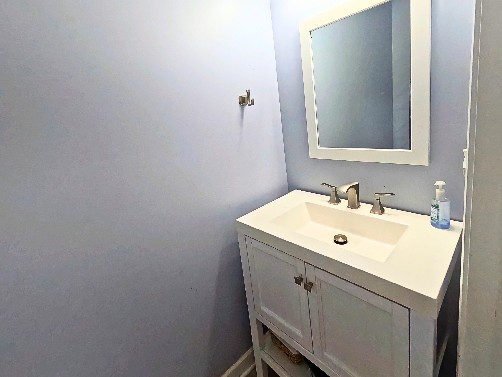 4631 Turquoise Lane Murfreesboro, TN 37129 - Photo 22 of 42 a bathroom with a sink and a mirror