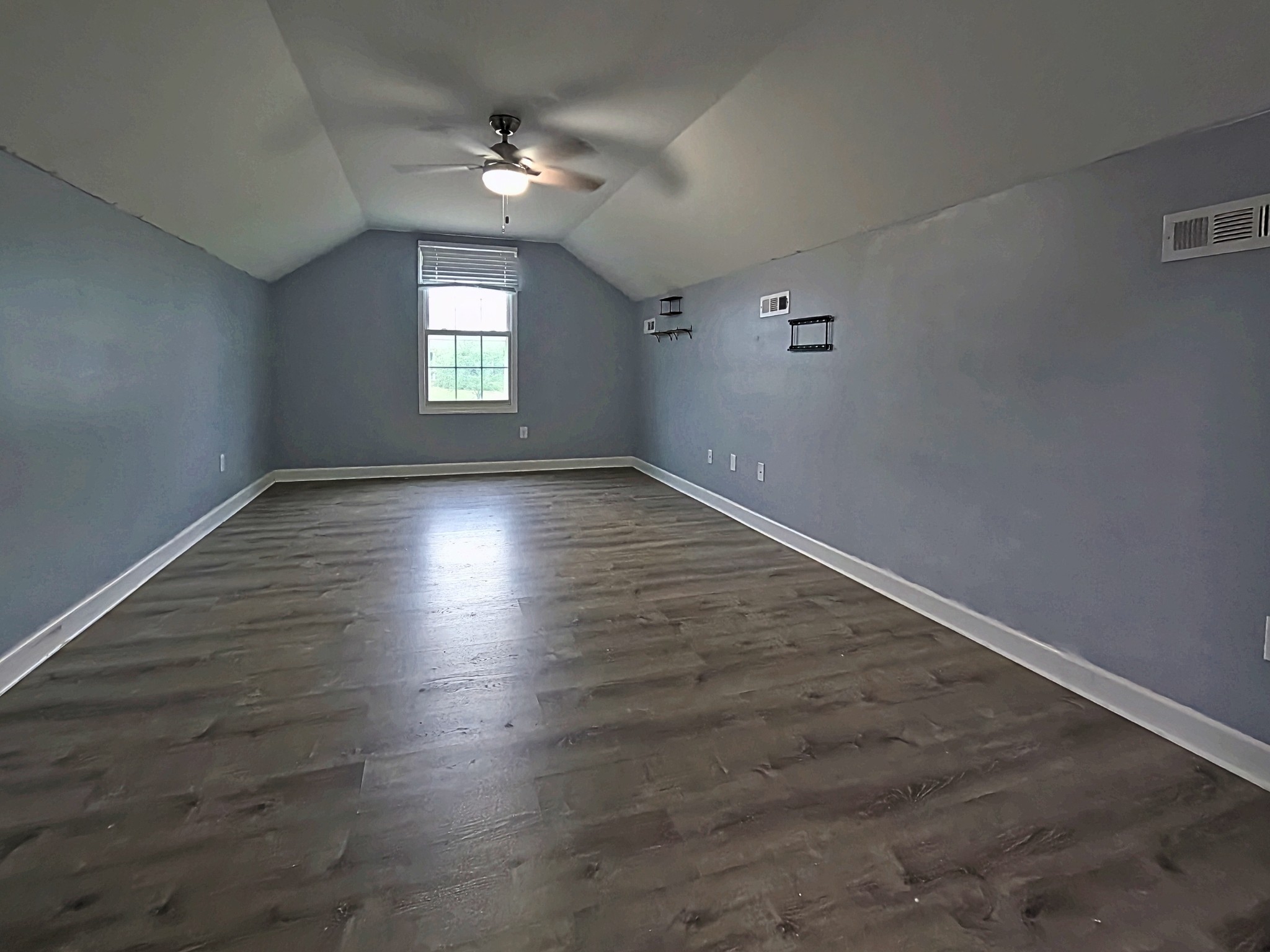 4631 Turquoise Lane Murfreesboro, TN 37129 - Photo 35 of 42 an empty room with wooden floor and windows