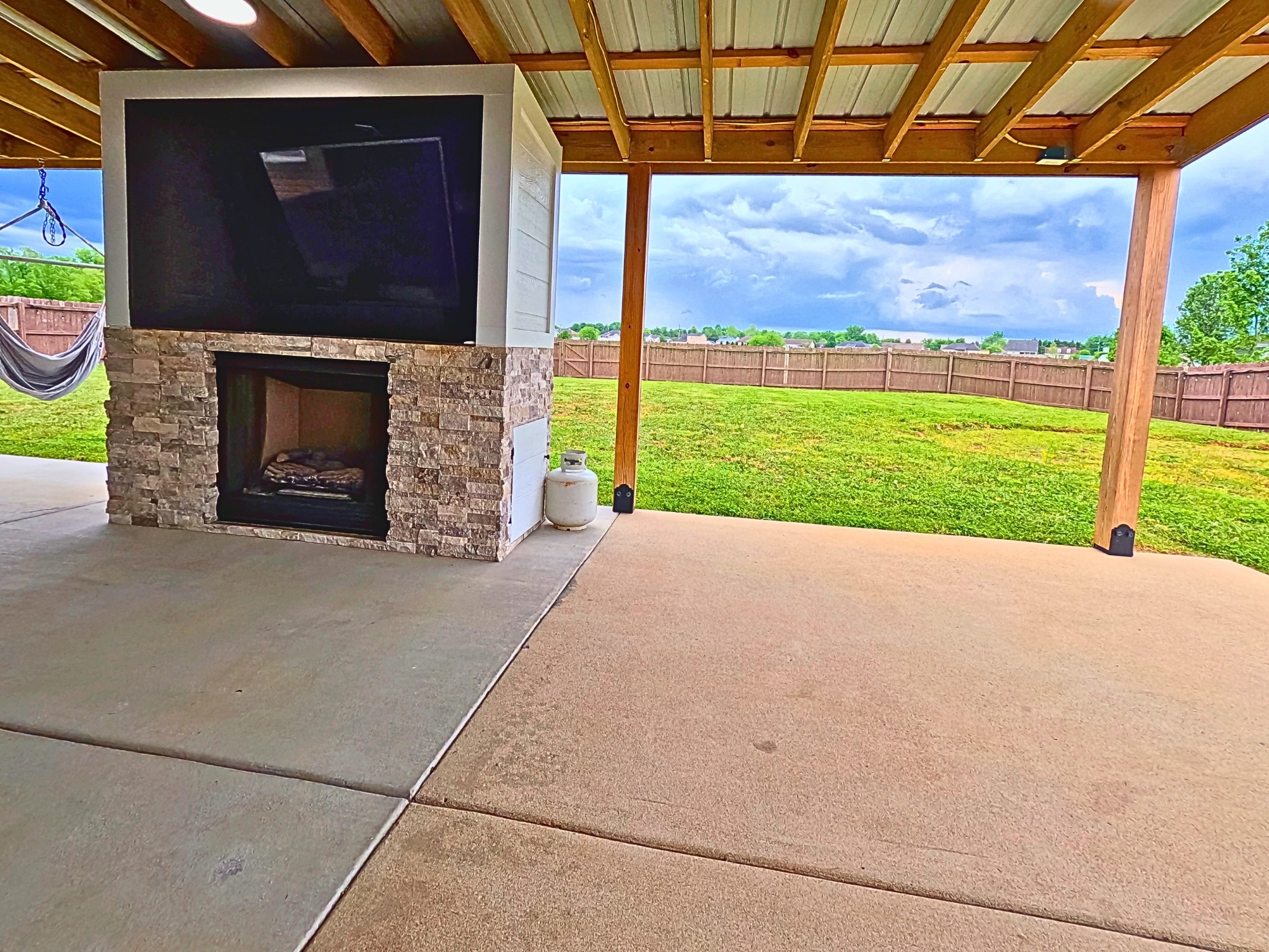 4631 Turquoise Lane Murfreesboro, TN 37129 - Photo 36 of 42 a view of a garden with a fireplace