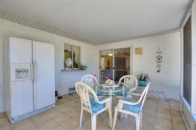 a view of a yard with large trees