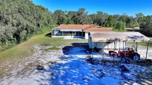 a view of a yard with an outdoor space