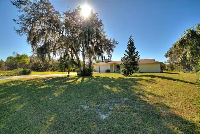 a view of pool with sitting area and lake view