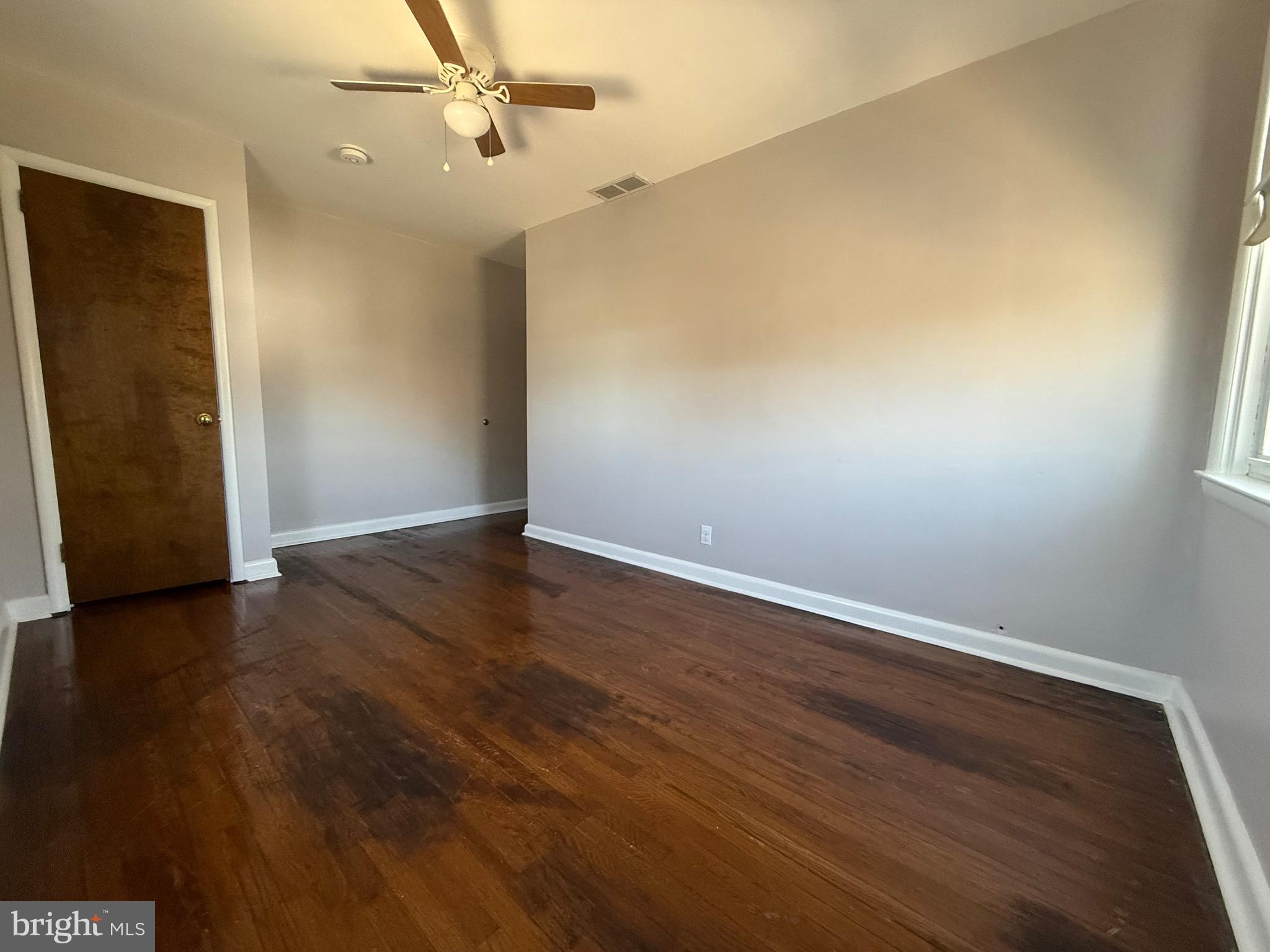 9083 Convent Avenue Philadelphia, PA 19136 - Photo 18 of 22 wooden floor in an empty room