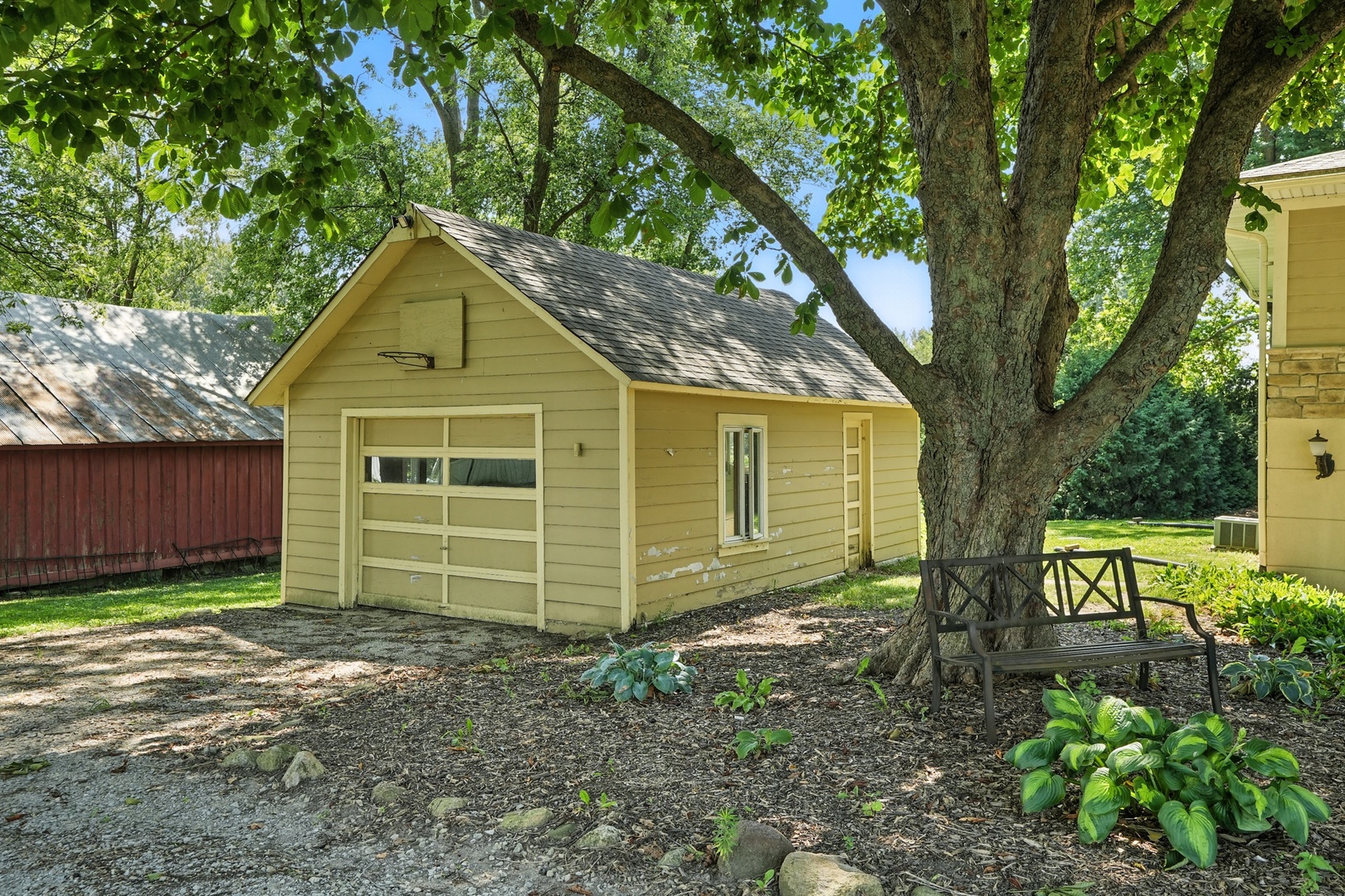 18409 Haas Road Mokena, IL 60448 - Photo 16 of 22 a front view of a house with garden