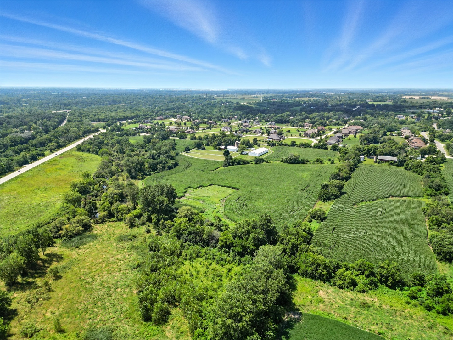 18409 Haas Road Mokena, IL 60448 - Photo 18 of 22 an aerial view of residential houses with outdoor space and trees