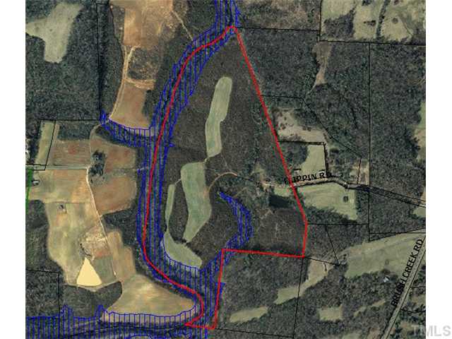 6816 Flippin Road Bennett, NC 27208 - Photo 1 of 1 a bird view of a house