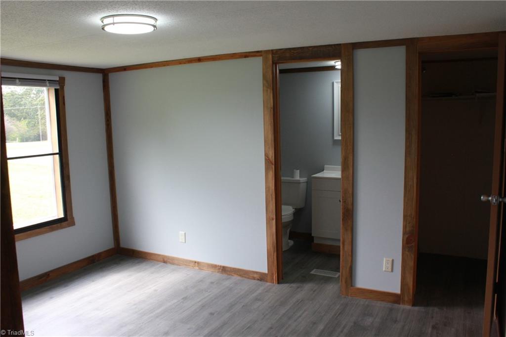 1022 Mitchell Road Pilot Mountain, NC 27041 - Photo 13 of 36 Primary bedroom/bathroom