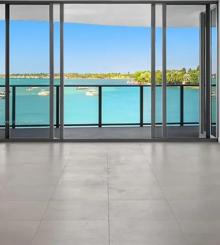 a view of a glass door with a road