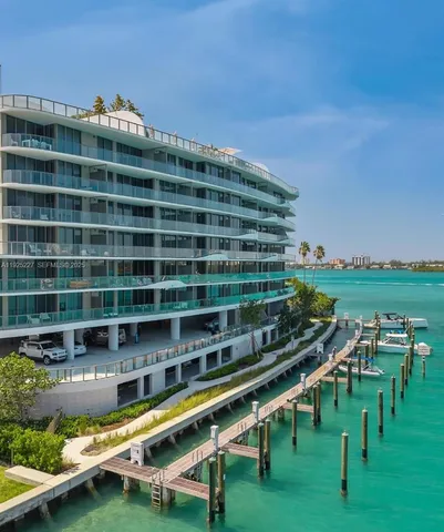 a kitchen with a sink cabinets and a window