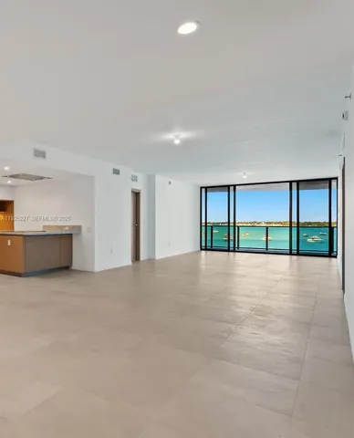 a view of lake with a city