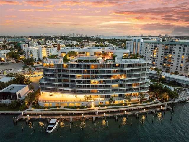a view of a big yard with table and chairs