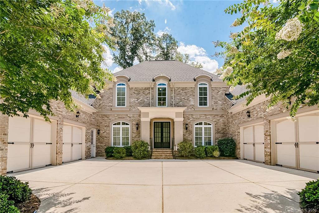 8116 Balcony Bridge Road Huntersville, NC 28078 - Photo 1 of 31 a front view of a house with a garden