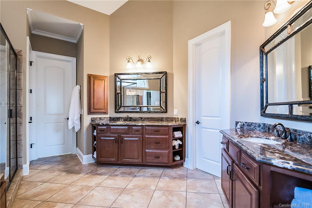 8116 Balcony Bridge Road Huntersville, NC 28078 - Photo 16 of 31 a bathroom with a granite countertop double vanity sink and a mirror