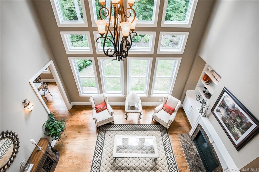 8116 Balcony Bridge Road Huntersville, NC 28078 - Photo 17 of 31 a living room with furniture and a large window