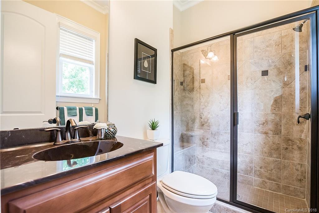 8116 Balcony Bridge Road Huntersville, NC 28078 - Photo 19 of 31 a bathroom with a sink a toilet and shower