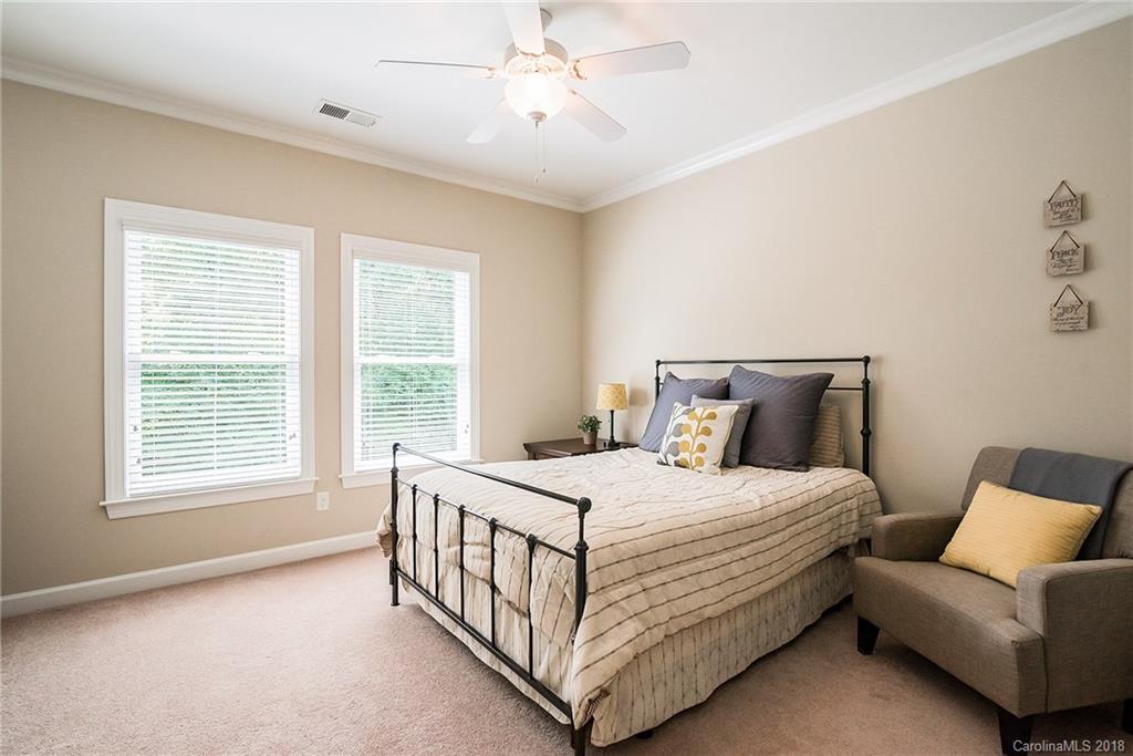 8116 Balcony Bridge Road Huntersville, NC 28078 - Photo 23 of 31 a bedroom with a bed couch and window