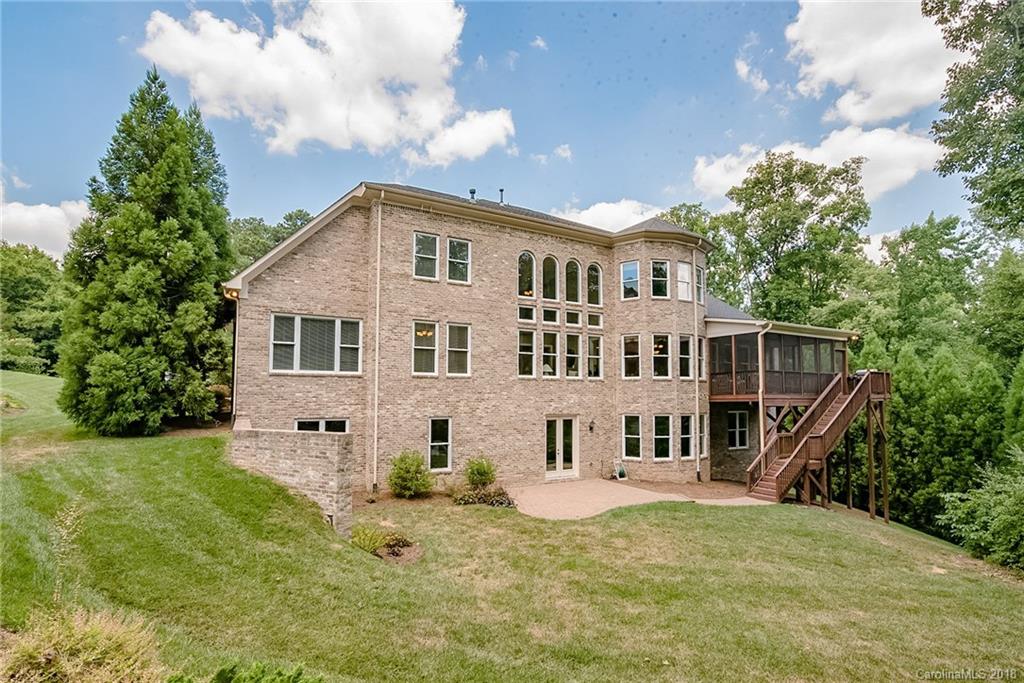 8116 Balcony Bridge Road Huntersville, NC 28078 - Photo 25 of 31 a house with trees in the background