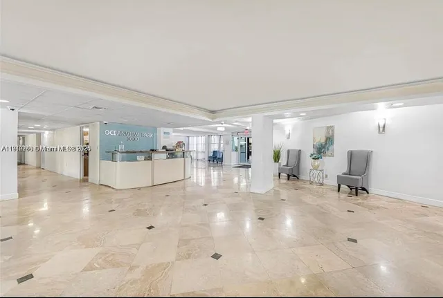 a view of livingroom with furniture and window