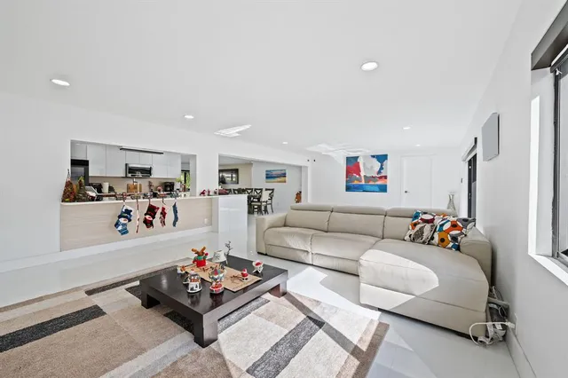 a living room with furniture and a couch