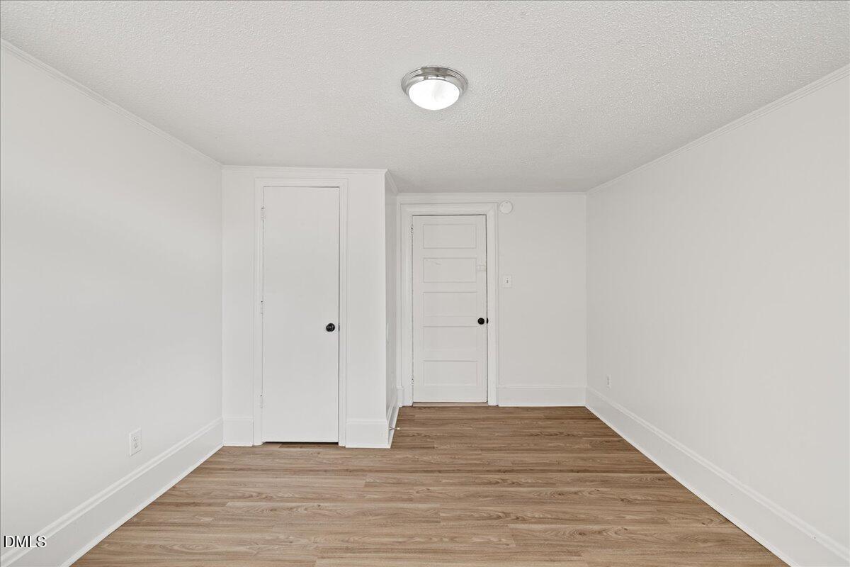 108 West Garner Road Garner, NC 27529 - Photo 18 of 53 a view of empty room with wooden floor