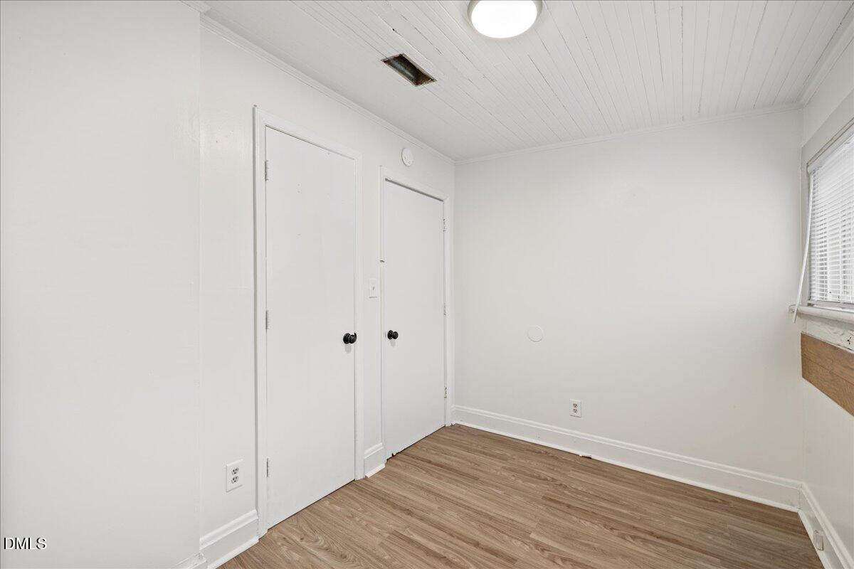 108 West Garner Road Garner, NC 27529 - Photo 23 of 53 a view of an empty room with wooden floor