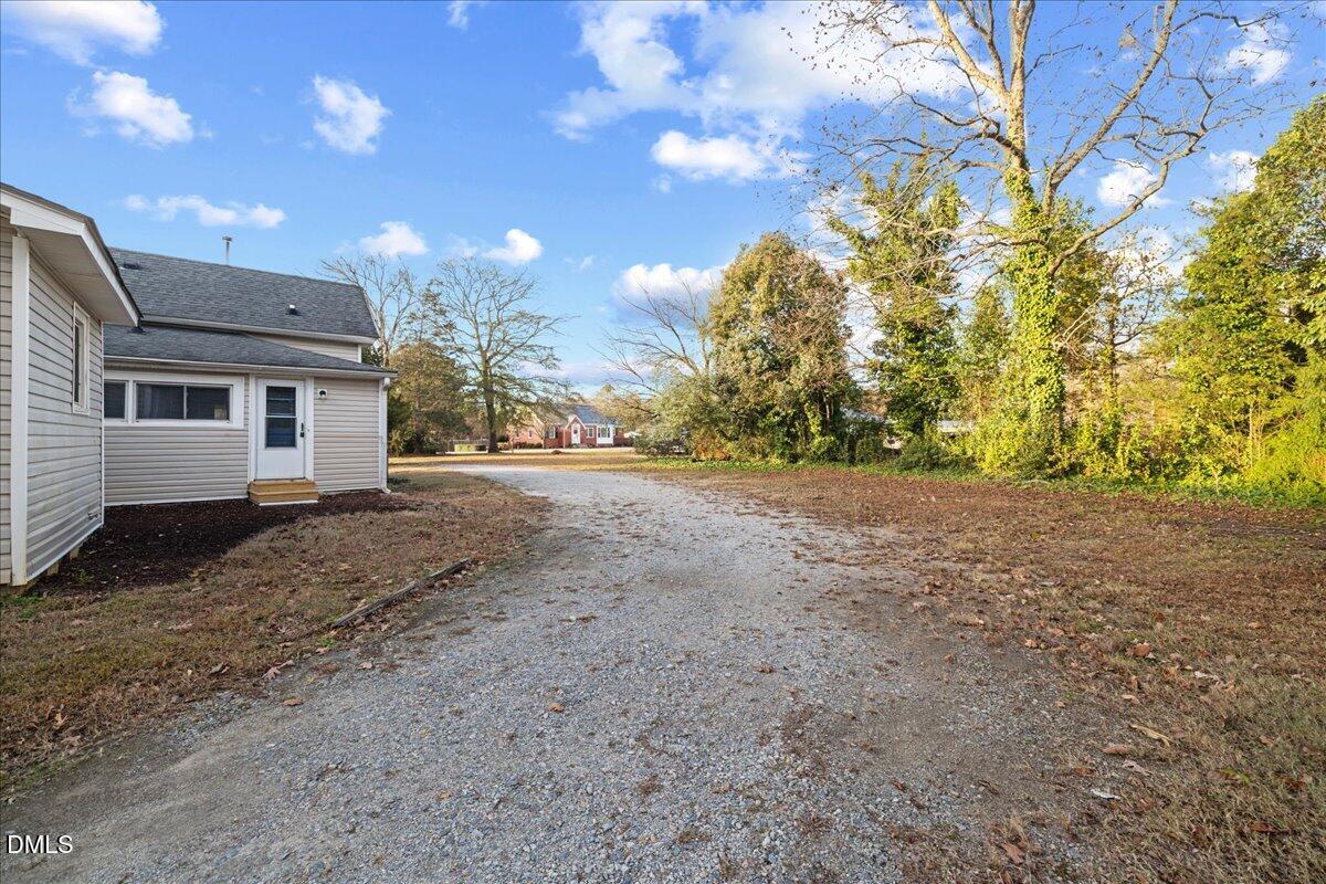 108 West Garner Road Garner, NC 27529 - Photo 26 of 53 a view of a house with a yard and garage