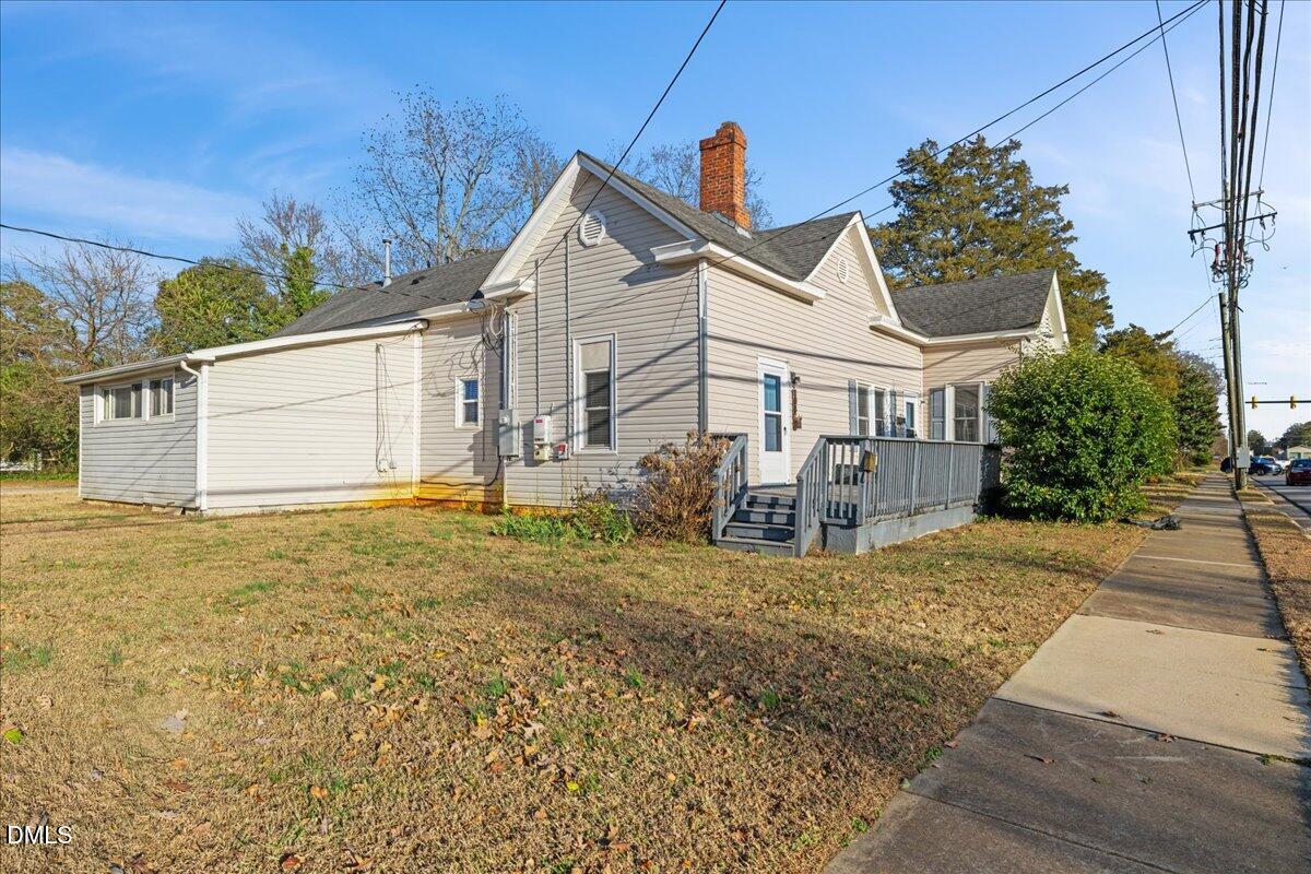 108 West Garner Road Garner, NC 27529 - Photo 4 of 53 a view of a house with a yard