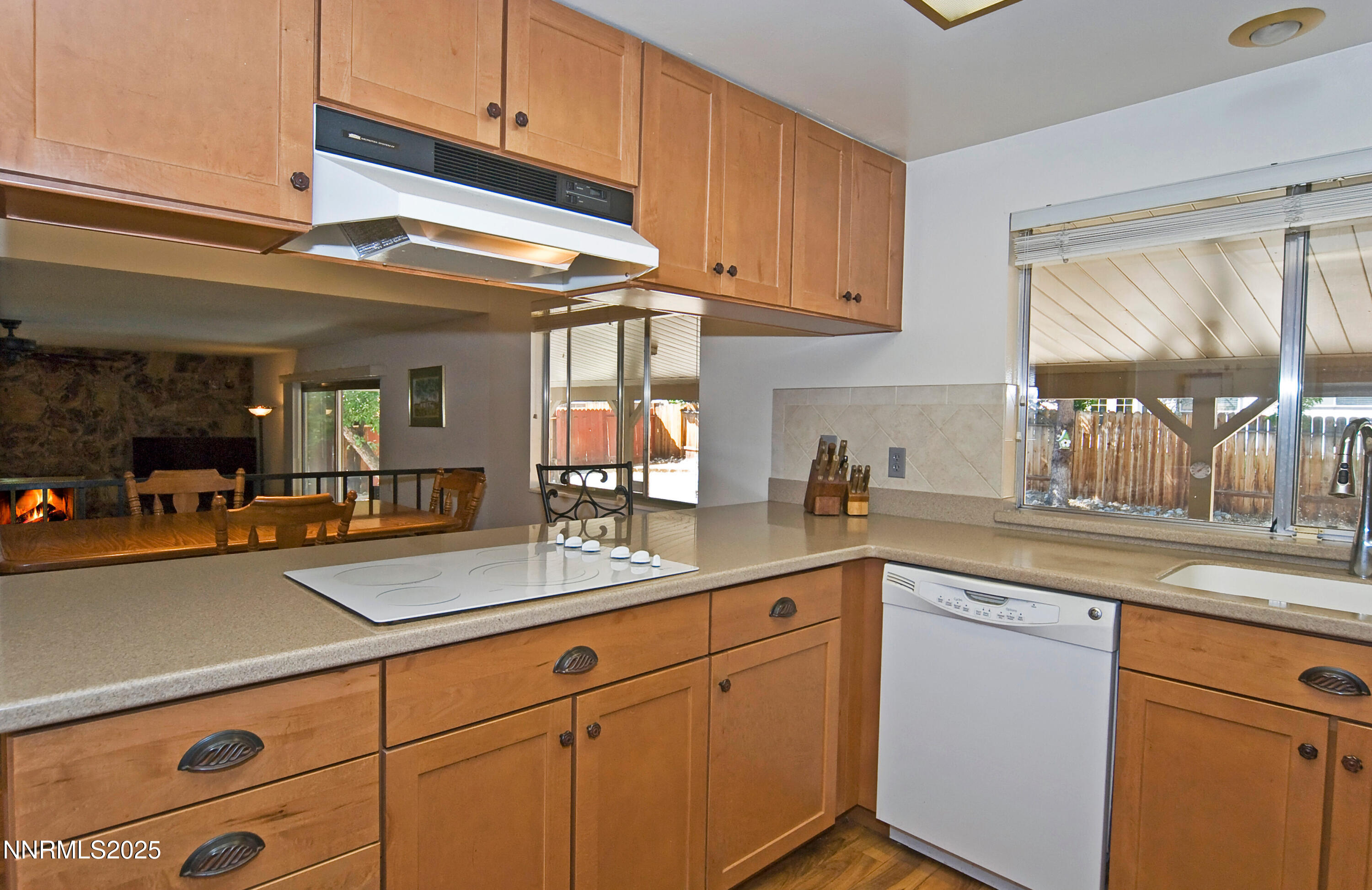 4875 Golden Springs Drive Reno, NV 89509 - Photo 11 of 33 a kitchen with stainless steel appliances granite countertop a sink and cabinets
