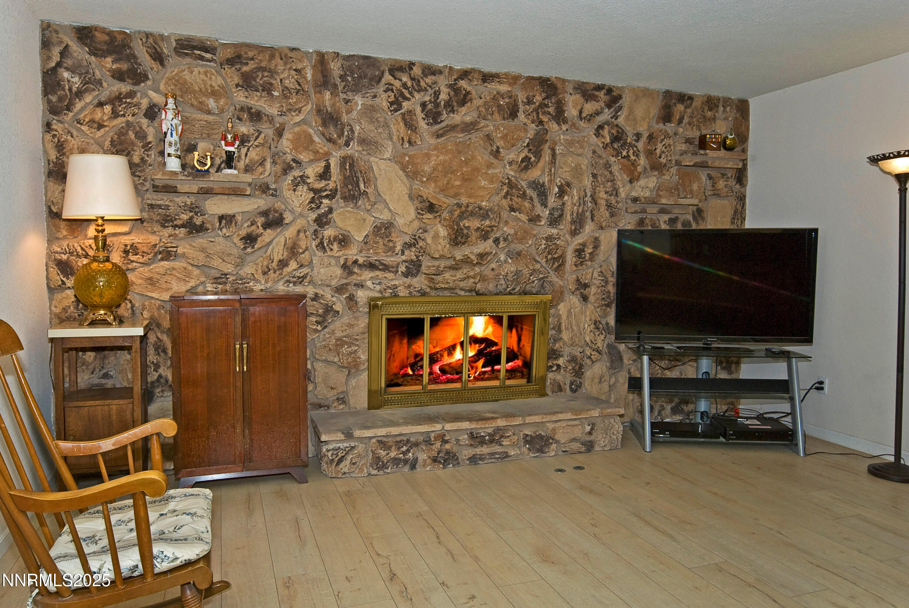 4875 Golden Springs Drive Reno, NV 89509 - Photo 13 of 33 a living room with furniture and a flat screen tv