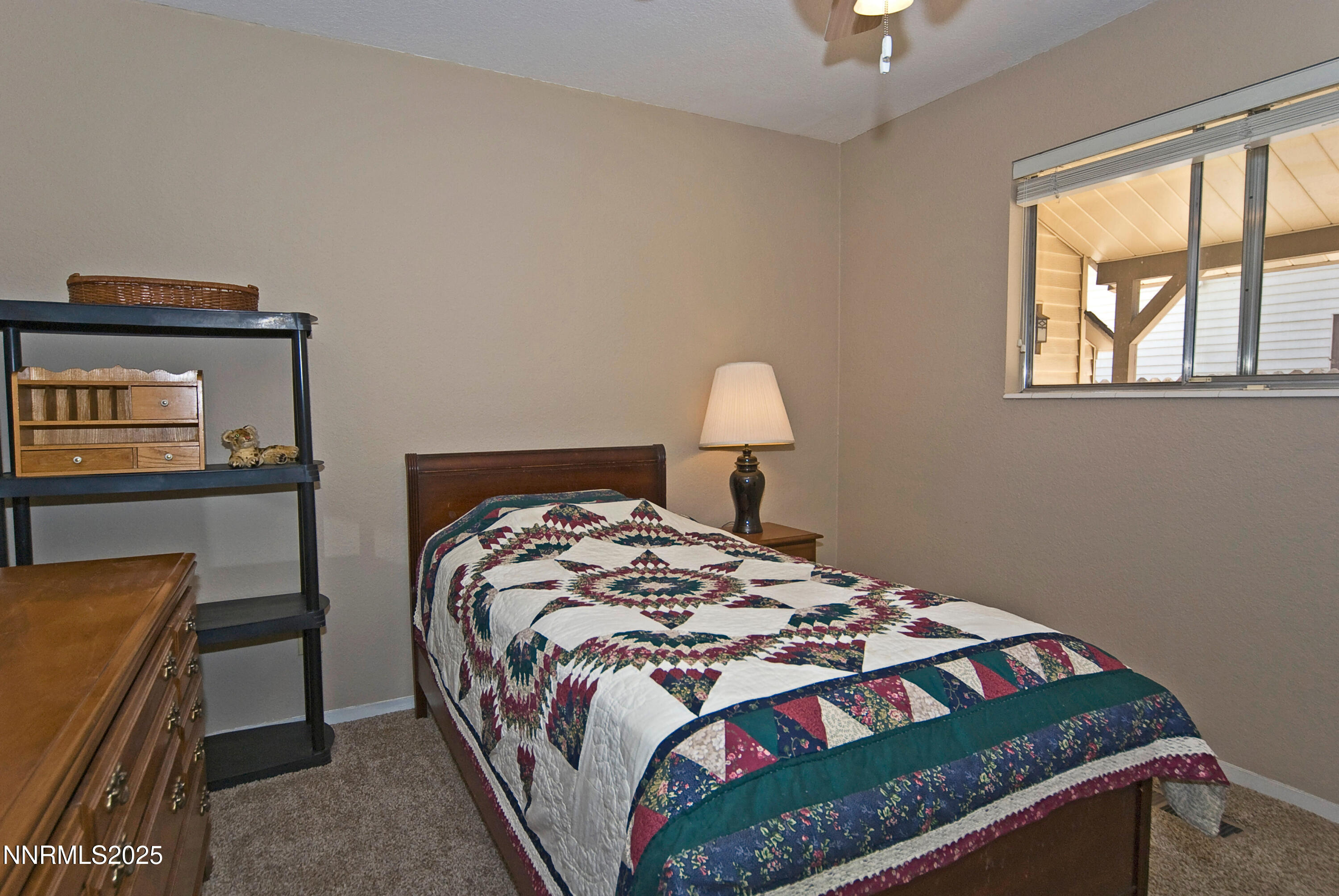 4875 Golden Springs Drive Reno, NV 89509 - Photo 15 of 33 a bedroom with a bed and a window