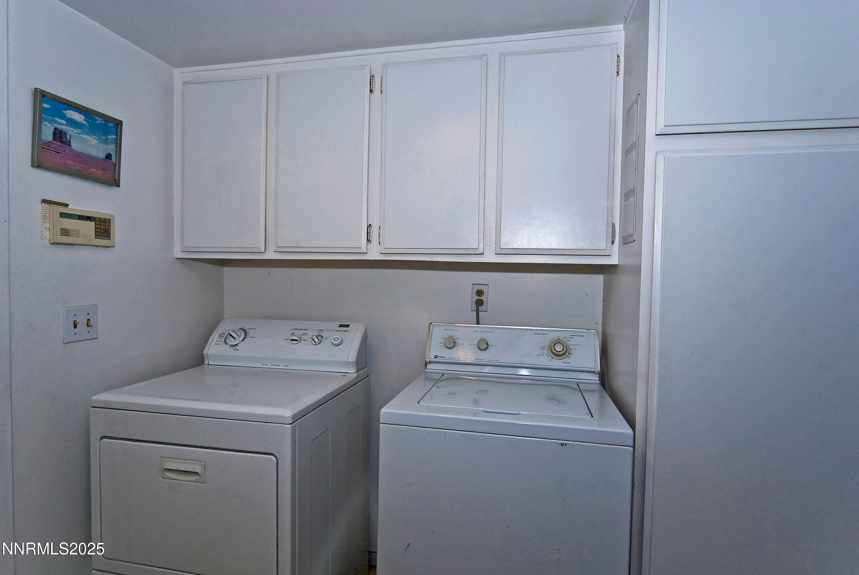 4875 Golden Springs Drive Reno, NV 89509 - Photo 17 of 33 a utility room with dryer and washer