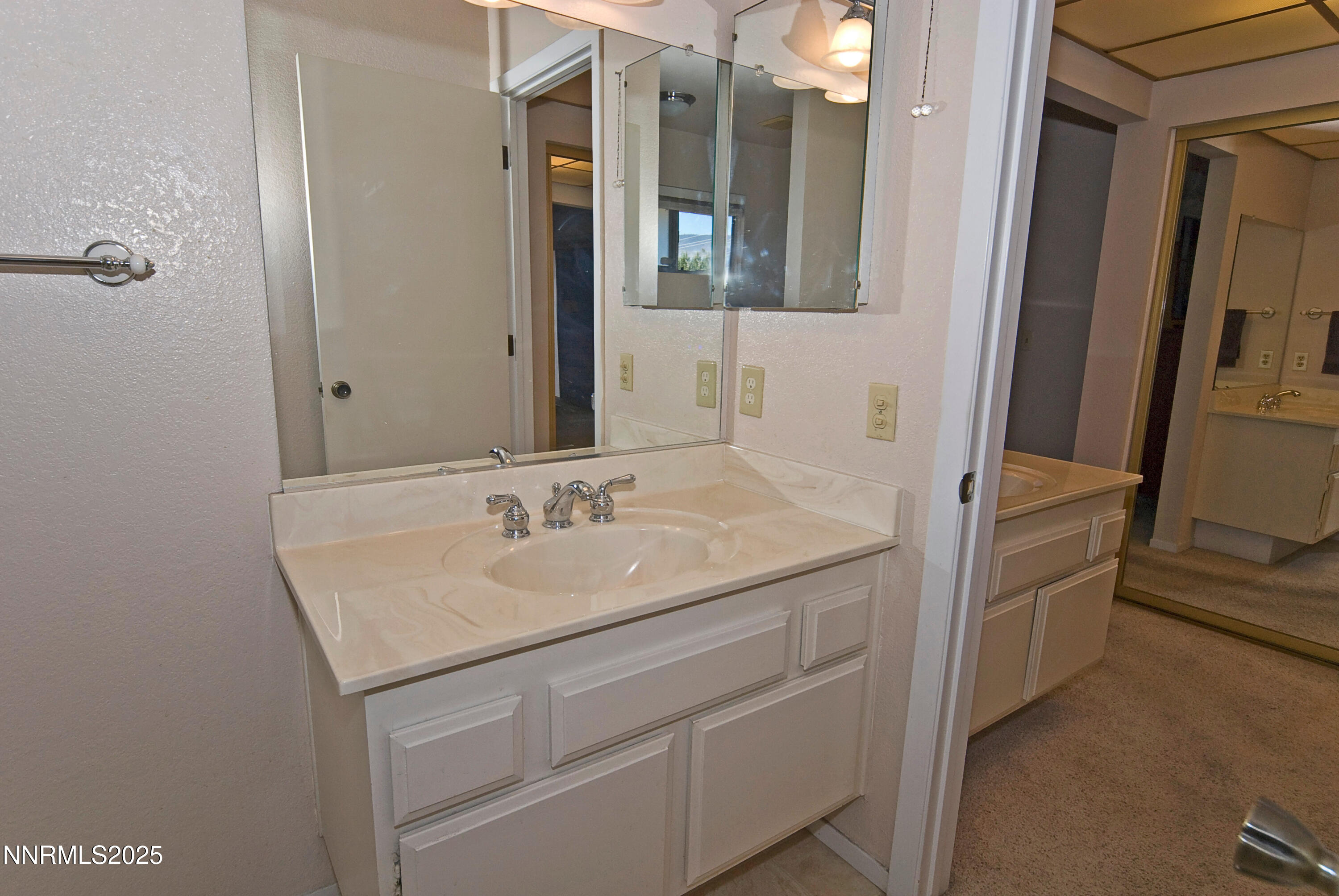 4875 Golden Springs Drive Reno, NV 89509 - Photo 25 of 33 a bathroom with a sink and a mirror