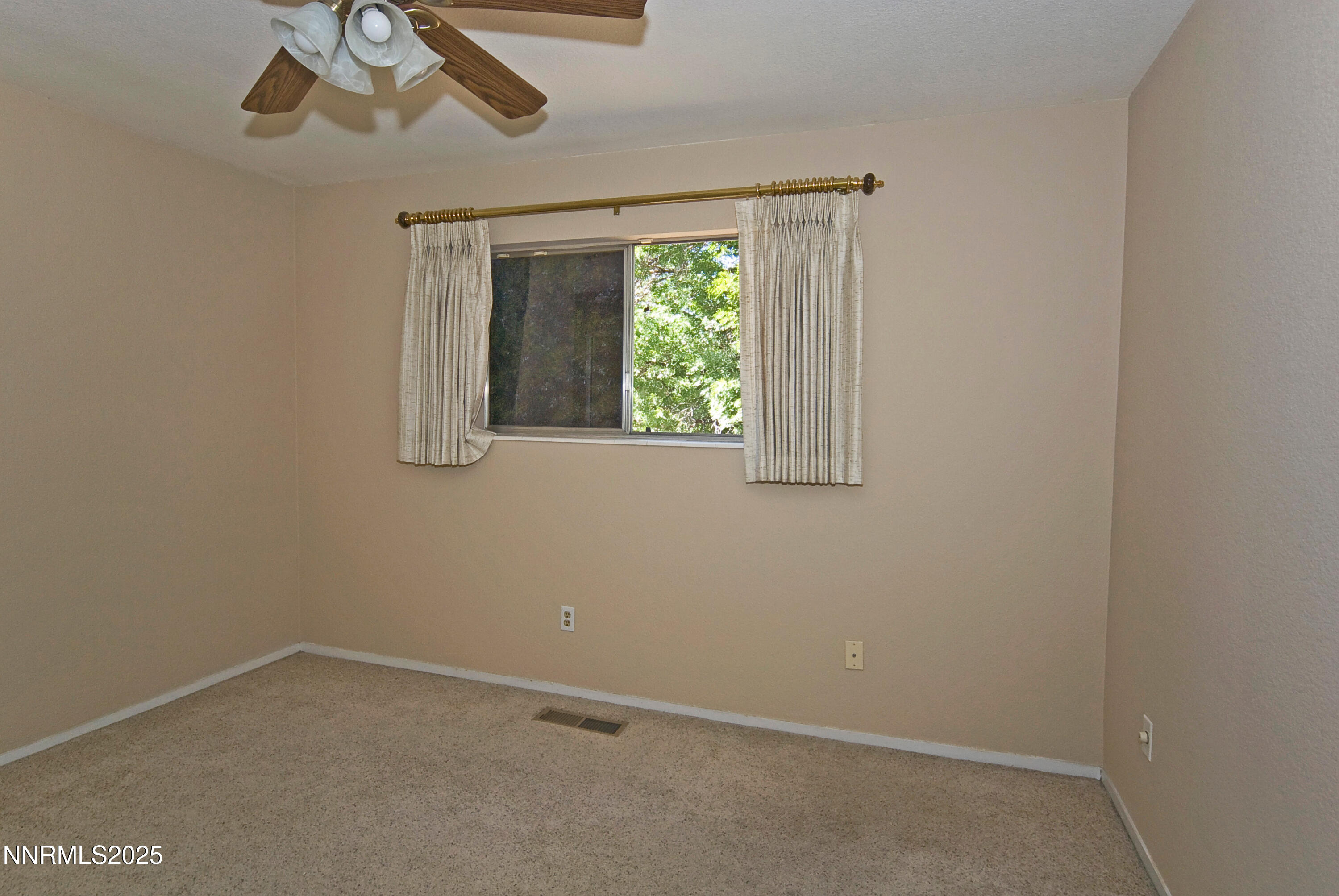 4875 Golden Springs Drive Reno, NV 89509 - Photo 28 of 33 an empty room with a window