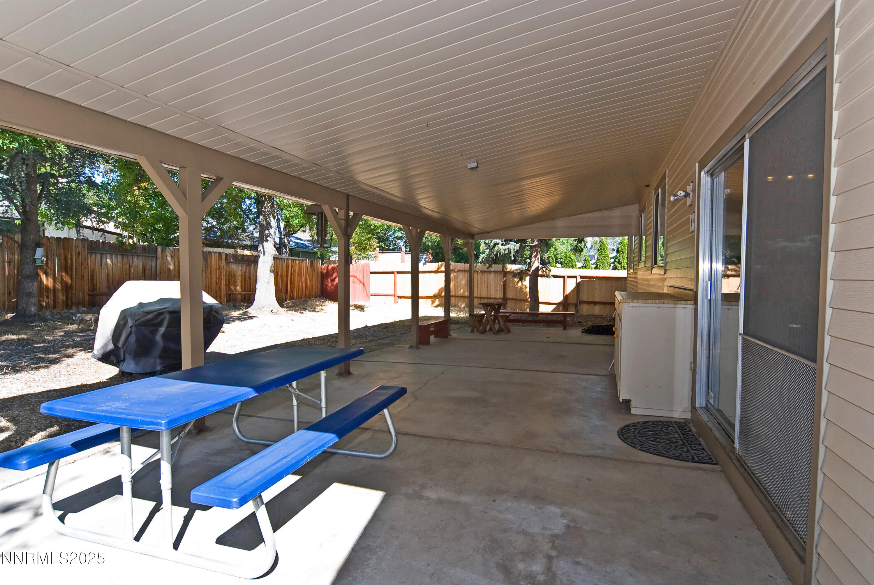 4875 Golden Springs Drive Reno, NV 89509 - Photo 29 of 33 a view of a patio with a table chairs and a patio