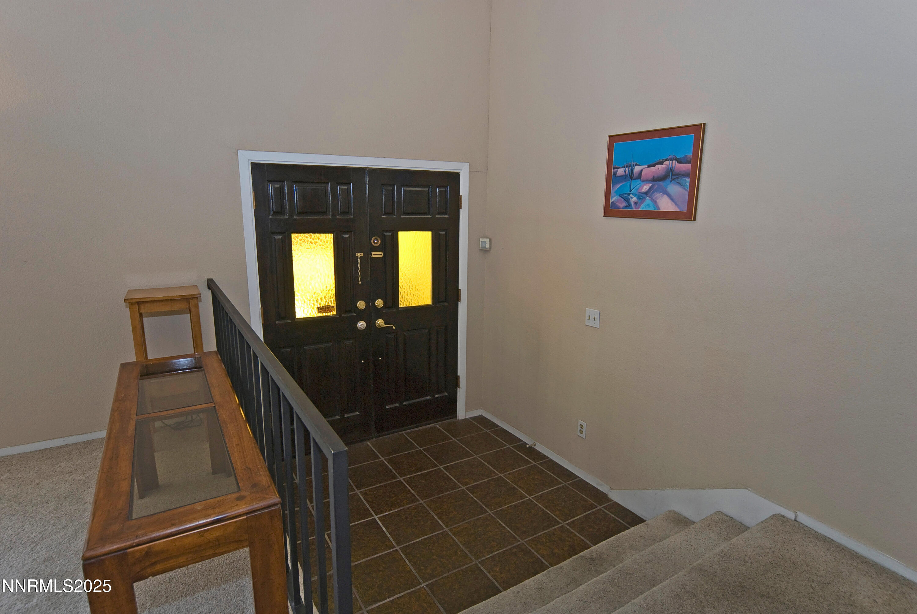 4875 Golden Springs Drive Reno, NV 89509 - Photo 5 of 33 a view of an empty room with wooden floor and a window