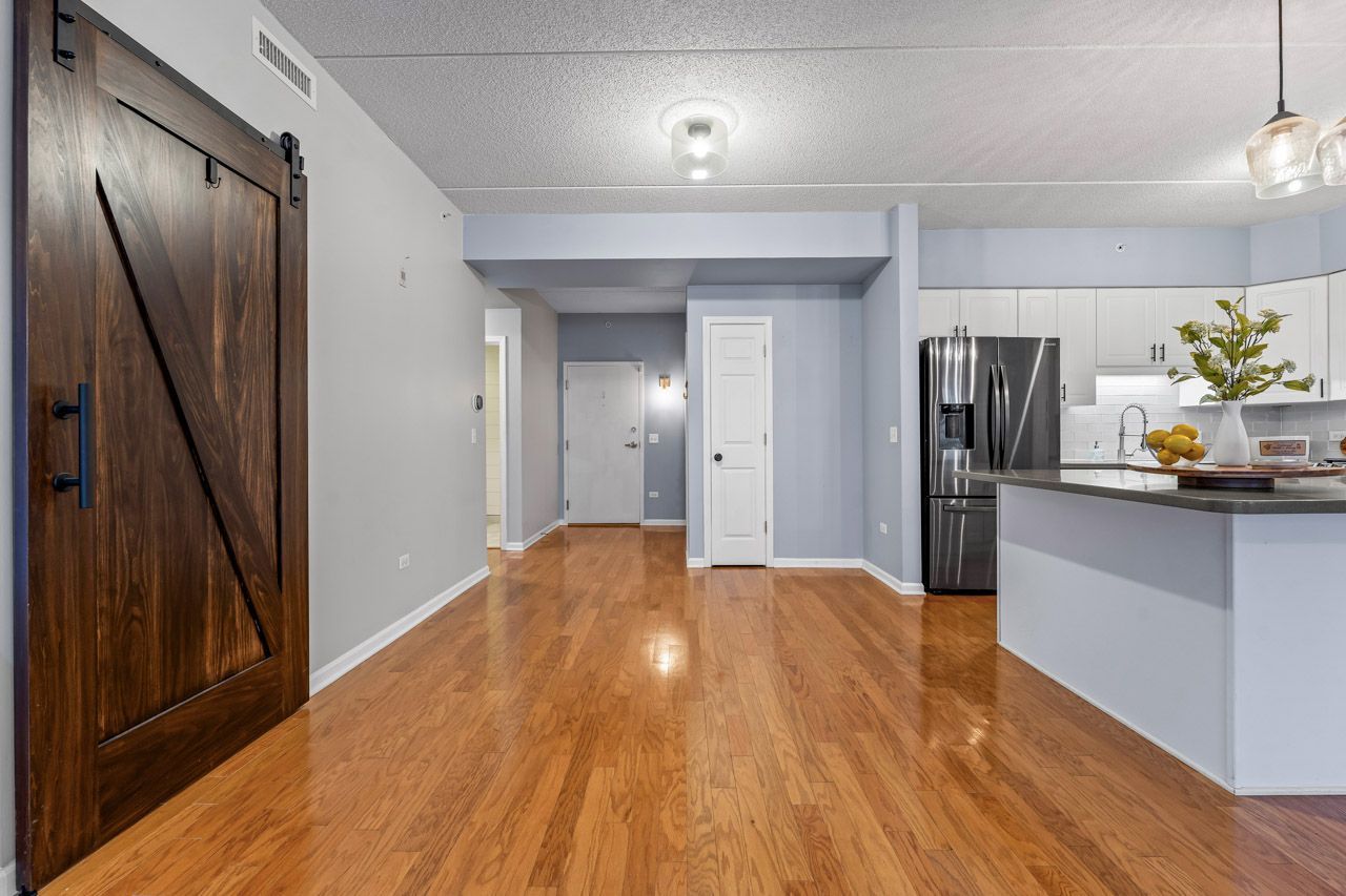 133 West Palatine Road, Unit 108 Palatine, IL 60067 - Photo 20 of 37 a view of a kitchen from the hallway