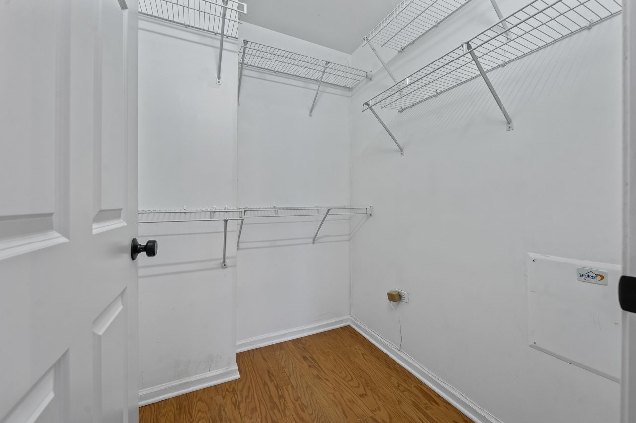 133 West Palatine Road, Unit 108 Palatine, IL 60067 - Photo 27 of 37 a view of a room with racks on the wall