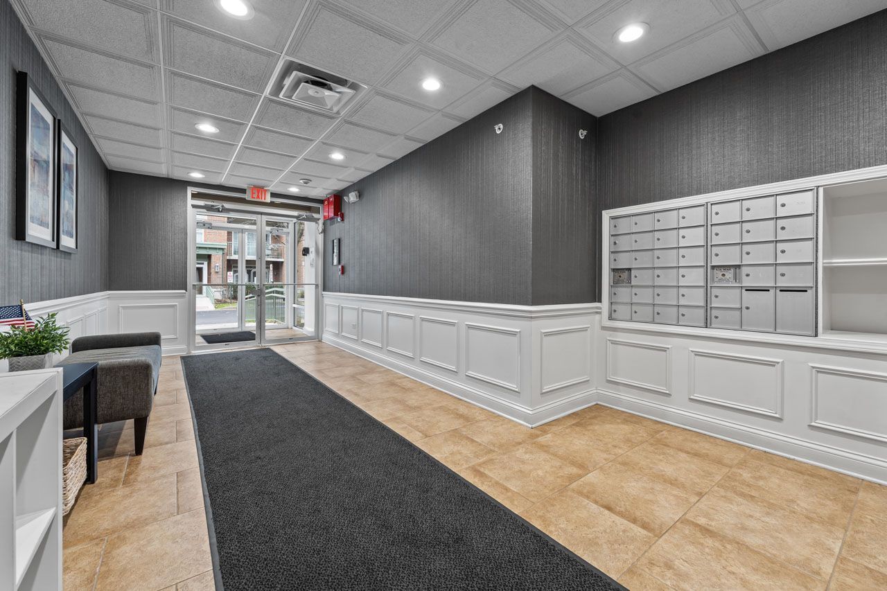 133 West Palatine Road, Unit 108 Palatine, IL 60067 - Photo 30 of 37 a view of an empty room with wooden floor and windows