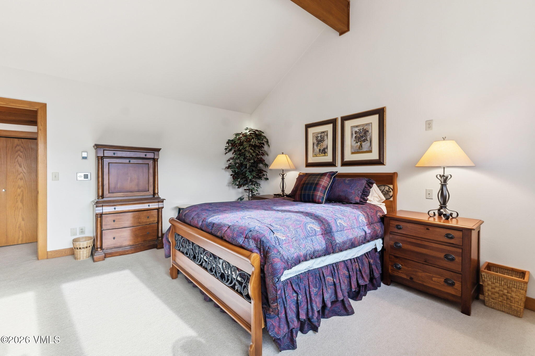 1460 Ridge Lane, Unit D Vail, CO 81657 - Photo 6 of 18 a spacious bedroom with a bed and dresser