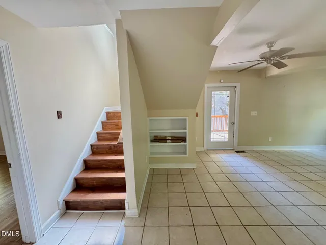a view of entryway and hall with a window